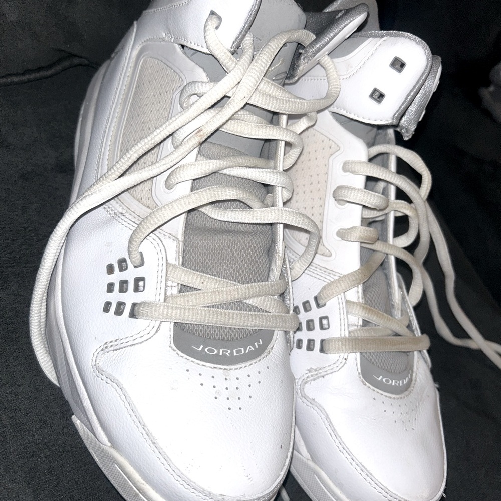 Men’s size 10 white and grey Jordan’s worn once on the basketball court.